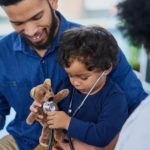 Photo of a parent and child at the doctor