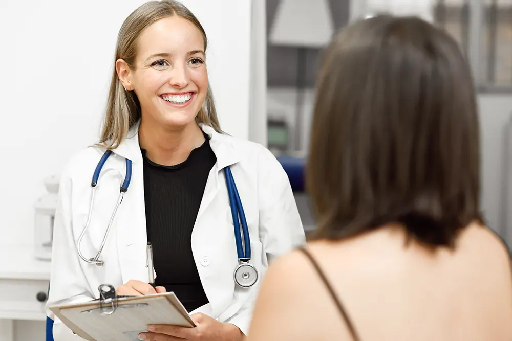 Image of a woman with a doctor.